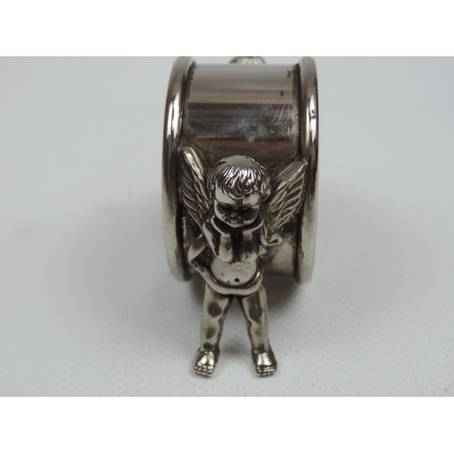 207 - A Late Victorian Silver Plate Figural Napkin Ring of Two Winged Cherubs - Diameter is Approx 1.75