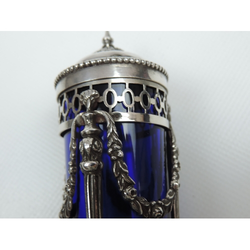 210 - A Dutch Silver Pepper Pot with Blue Glass Liner the Silver Frame Pierced Top and Bottom Pierced also... 