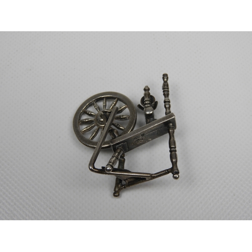 297 - Silver Miniature: A Dutch Silver Miniature Sewing Machine - Hallmarked with the Dutch Sword Mark and... 