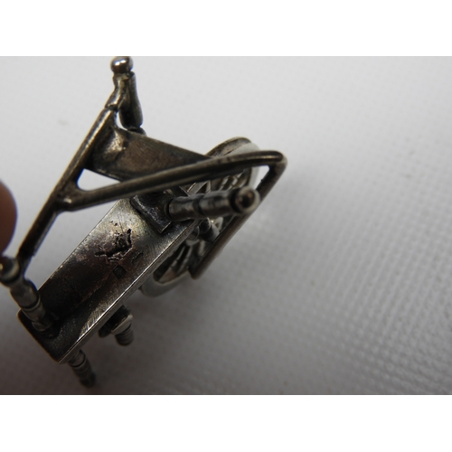 297 - Silver Miniature: A Dutch Silver Miniature Sewing Machine - Hallmarked with the Dutch Sword Mark and... 