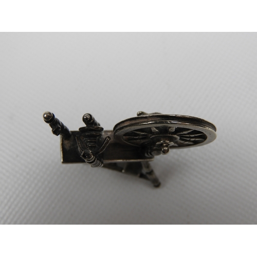 297 - Silver Miniature: A Dutch Silver Miniature Sewing Machine - Hallmarked with the Dutch Sword Mark and... 