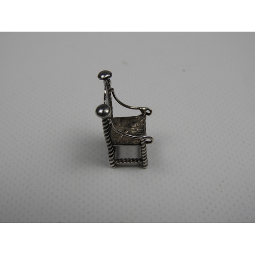 321 - Silver Miniature: A Dutch Silver Miniature of a Carver Chair the Backrest Embossed with a Musician -... 