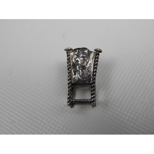 321 - Silver Miniature: A Dutch Silver Miniature of a Carver Chair the Backrest Embossed with a Musician -... 