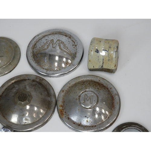 165 - Classic Car Wheel Hub Covers, including MG and Morris, and a Headlamp Cover and a Morris Radiator Ba... 