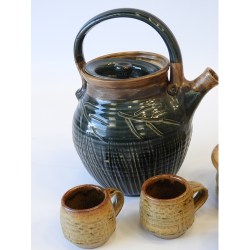 594 - Devon Studio Pottery - A Teapot and Milk Jug Marked ‘TP’, in Green together with 6x Coffee Cups and ... 