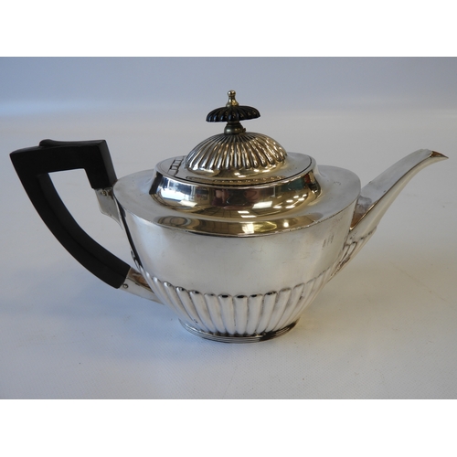 21 - An Edwardian Silver Tea Set - Teapot, Cream/Milk and Sugar with Part-fluted Decoration, Scroll Handl... 