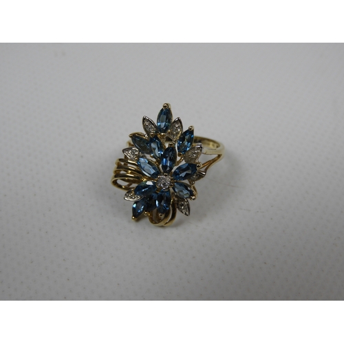 301 - 9ct Yellow Gold Ring Set with Aquamarines and Diamonds