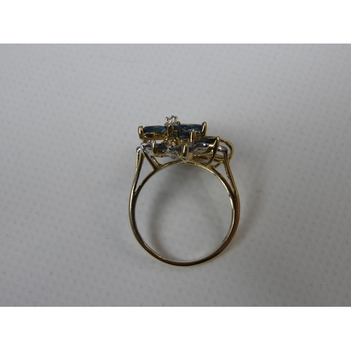 301 - 9ct Yellow Gold Ring Set with Aquamarines and Diamonds