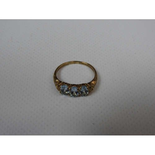 338 - 9ct Yellow Gold Topaz Three Stone Ring