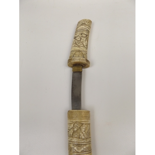 31 - Carved Bone Cased Dagger