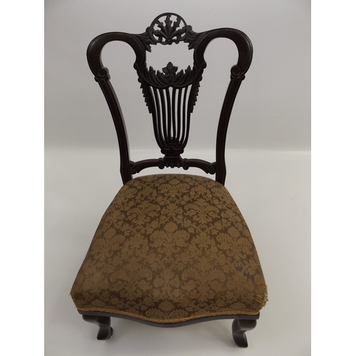 447 - Pair of Upholstered Low Seated Chairs with Carved Detail