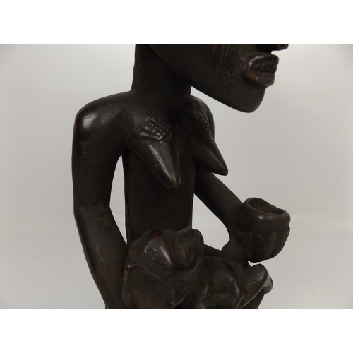 564 - 2x Carved African Figures - Largest 24