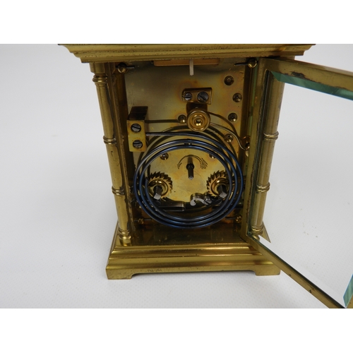 27 - Leather Fitted Cased Enamel Faced Brass Carriage Clock