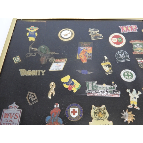 561 - Framed Collection of Badges - To include Girl Guides Civil Defence and Trains