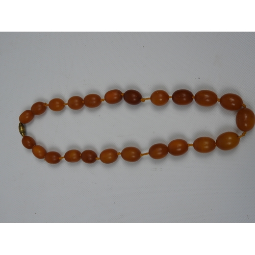 66 - Necklace - String of Amber Coloured Beads