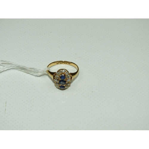 285 - 18ct Gold Diamond and Sapphire Ring