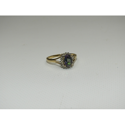 355 - 9ct Gold Topaz and Diamond Ring