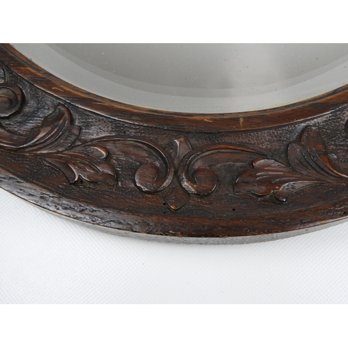 255 - Edwardian Oval Carved Oak Wood Framed Bevel Edged Mirror