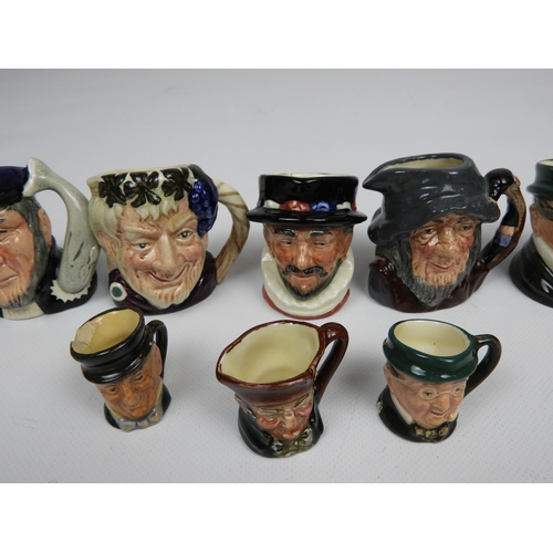 604 - Collection of Miniature Character Jugs