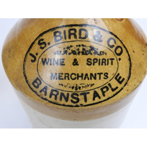 199 - 2x Barnstaple Stoneware Flagons - One J. S. Bird & Co, Other Arnold Perrett & Co.