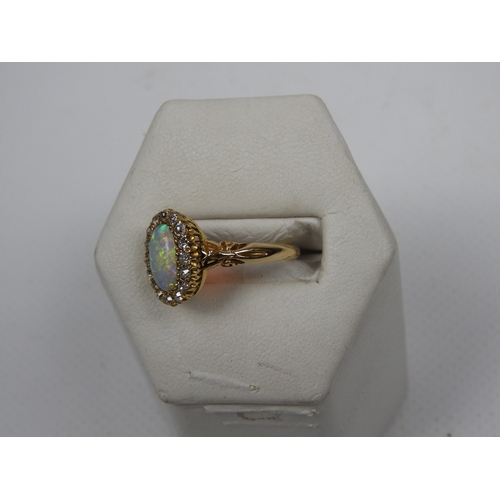 365 - 18ct Hallmarked Diamond and Opal Ring