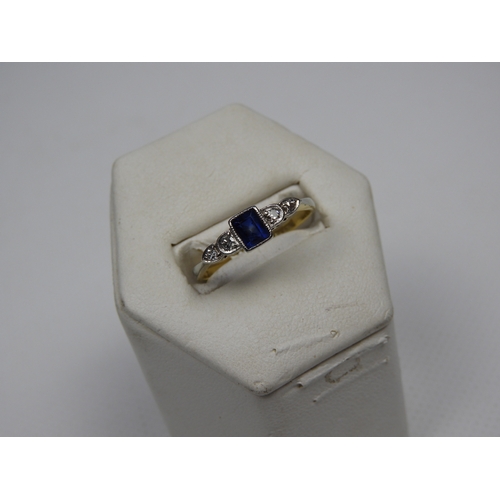 403 - 18ct Gold and Platinum 1/2 ct Emerald Cut Sapphire and Diamond Ring