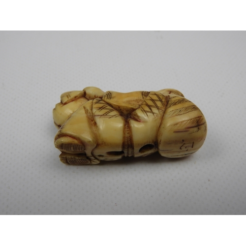 381 - Netsuke and Resin Buddha