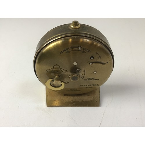 699 - 1950s Cyma Amic Brass Braille Alarm Clock