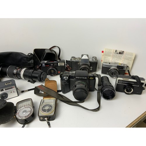 215 - Cameras, Lenses and Light Meters etc