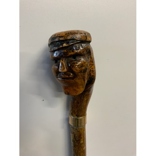 108 - Carved Head Walking Stick with 18ct Gold Mount