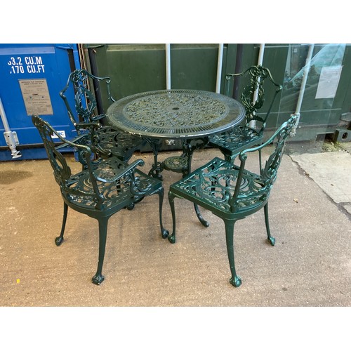 73 - Circular Metal Garden Table and 4x Chairs