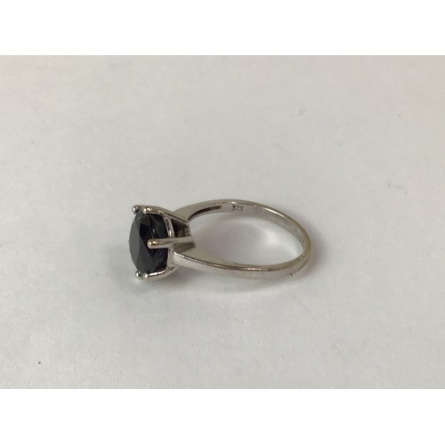 702 - 9ct White Gold with Black Sapphire