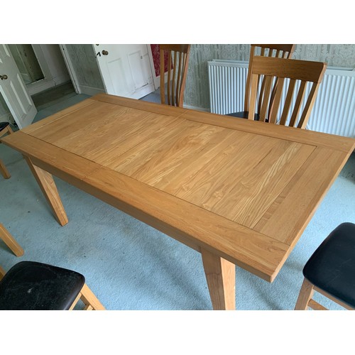 131 - Modern Oak Extending Dining Table and Chairs - 9ft When Extended