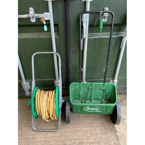 143A - Hose on Reel and Lawn Seed Spreader