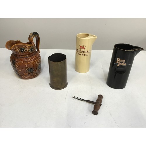 727 - Whisky Jugs, Trench Art and Cork Screw etc