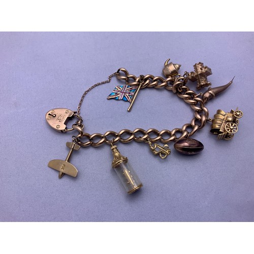 173 - 9ct Gold Charm Bracelet - All Charms Marked - 41gms