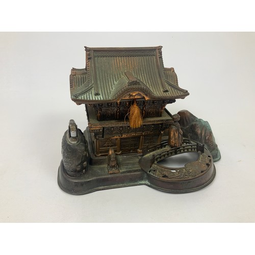 682 - Musical Oriental cigarette box in the form of a house