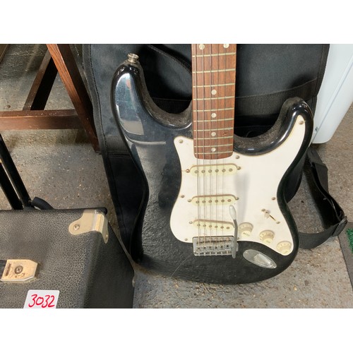 102 - Squier Electric Guitar with Stand and Amp