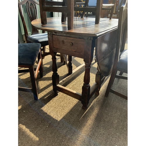 204A - Oak Drop Flap Table with Drawer with Eight Chairs to include Two Carvers