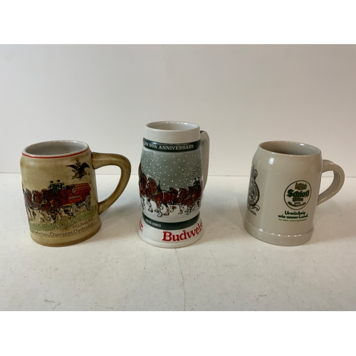 653 - 2x Budweiser Steins and One Other