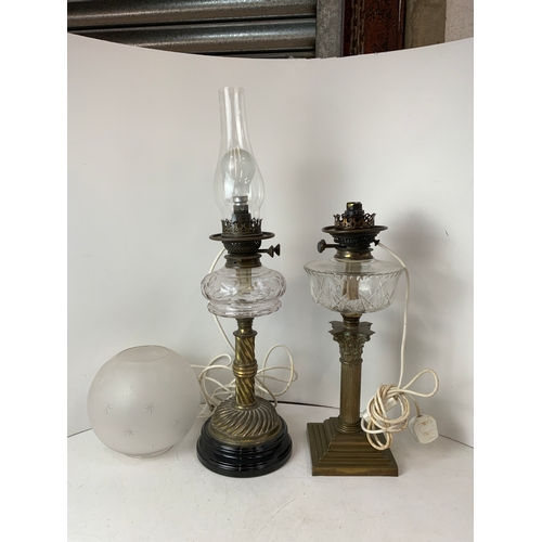 141 - 2x Decorative Brass Oil Lamps