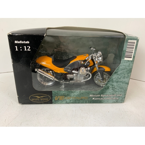 527 - Boxed Model Motorbike