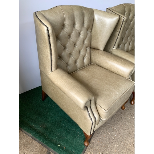 113 - Pair of Olive Button Back Wing Armchairs