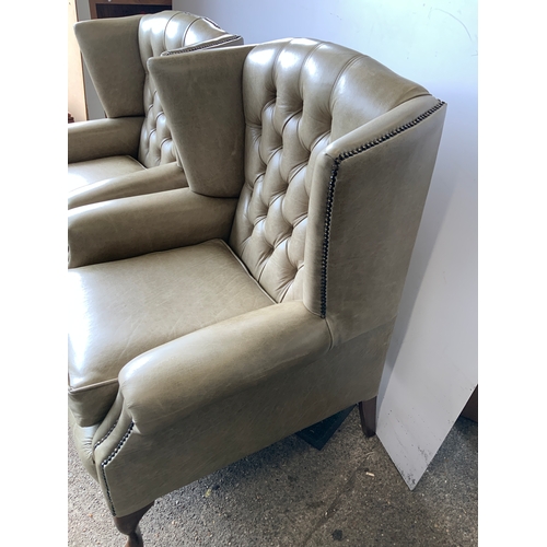 113 - Pair of Olive Button Back Wing Armchairs