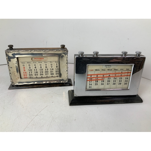 655 - 2x Perpetual Calendars - One Silver