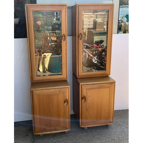 788 - Pair of Blonde Ercol Glass Cabinets with Cupboard Under