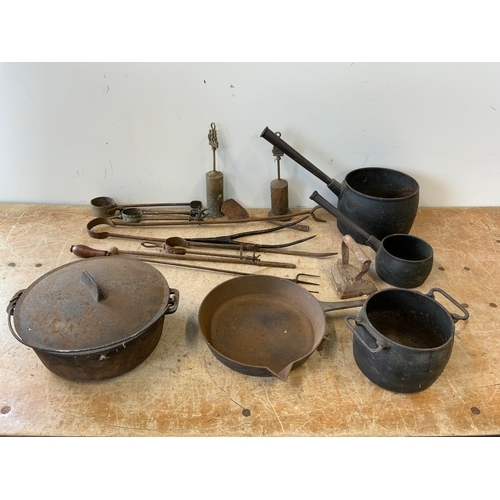 51 - Cast Iron Saucepans etc