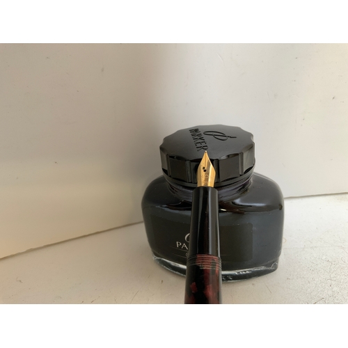 845 - Fountain Pen and Bottle of Ink