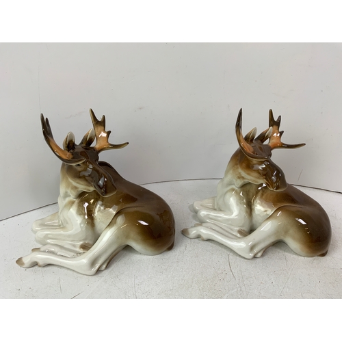 586 - Pair of Lomonosov Moose Ceramic Ornaments