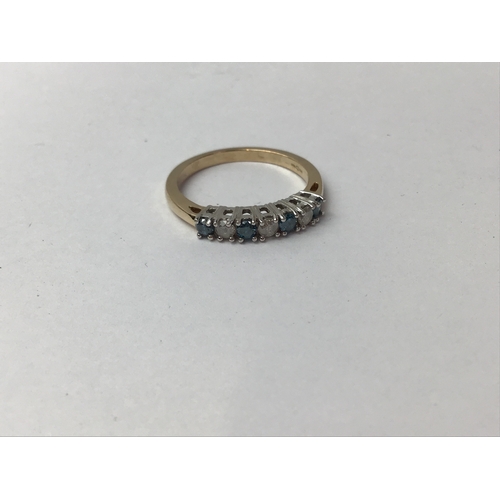 637 - 9ct Gold Blue Topaz and Diamond Ring - Size P